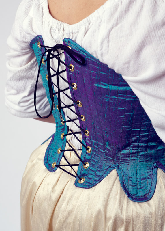 Renaissance era corset made of cotton coutil and covered with dupioni fabric. Stiffened with spring steel boning. Historically accurate silhouette