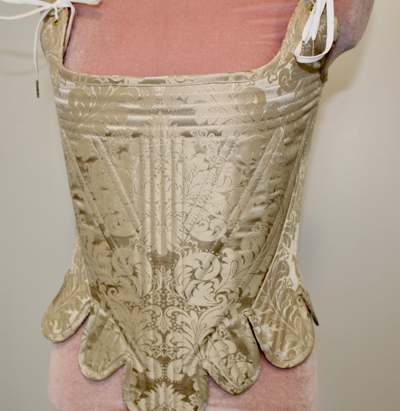 18th Century Colonial corset made of cotton coutil and covered with silk. Stiffened with spring steel boning. Historically accurate silhouette