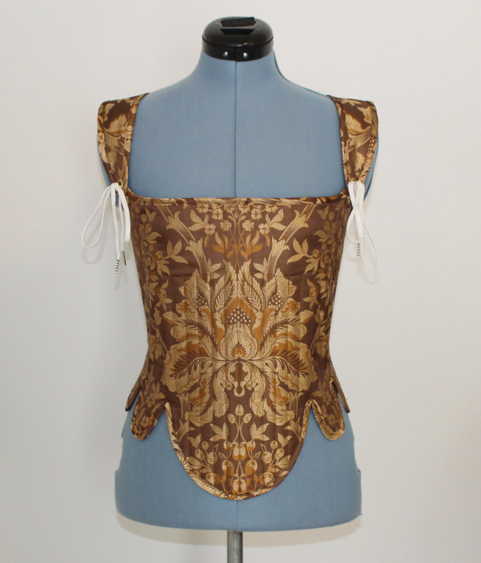 Renaissance era corset made of cotton coutil and covered with silk. Stiffened with spring steel boning. Historically accurate silhouette